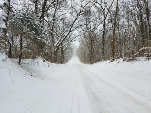 Out on the open dirt road, Brighton, Michigan, snow covered roads